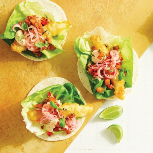 Fish tacos with pink pickled onions and tomato salsa