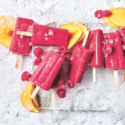 Peach and raspberry popsicles