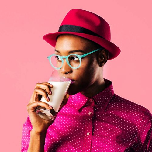 Woman drinking a glass of milk