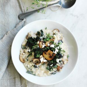 Savoury porridge with mushrooms, thyme, feta and kale