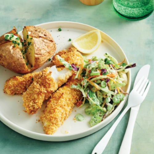 Crumbed fish with creamy slaw and baked potatoes